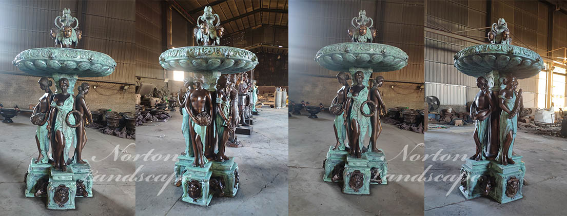 Bronze woman statues fountain