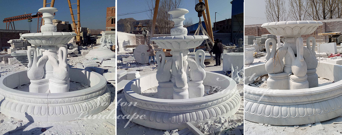 Marble fountain with swan statues