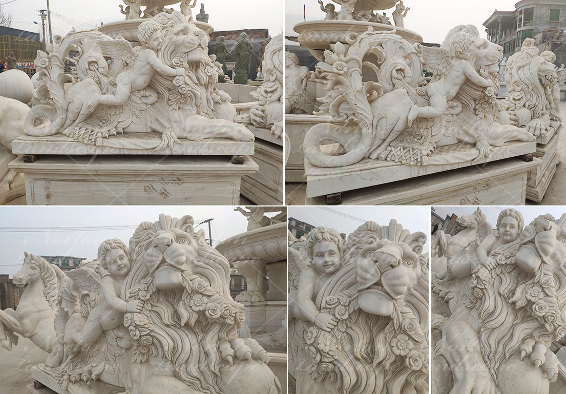 Marble cherub and lion statues