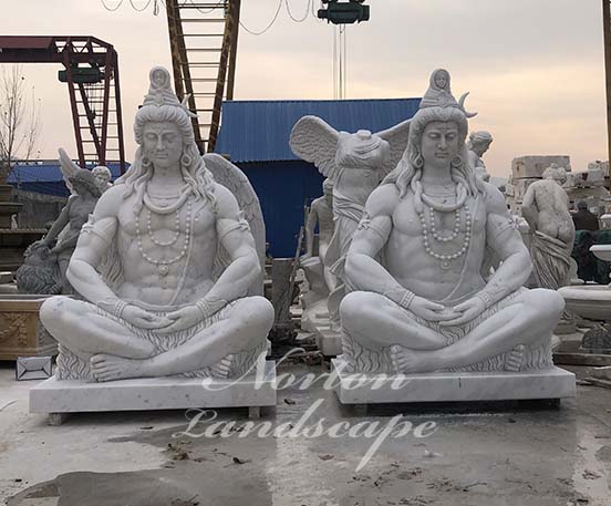 Large white marble sitting shiva statue