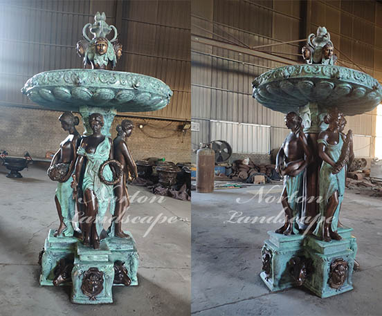 Bronze woman statues fountain