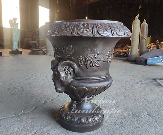 brass flowerpot with sheep head