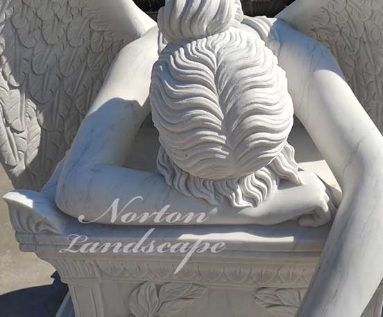 Weeping angel tombstone sculpture