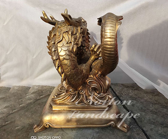 brass dragon sculpture