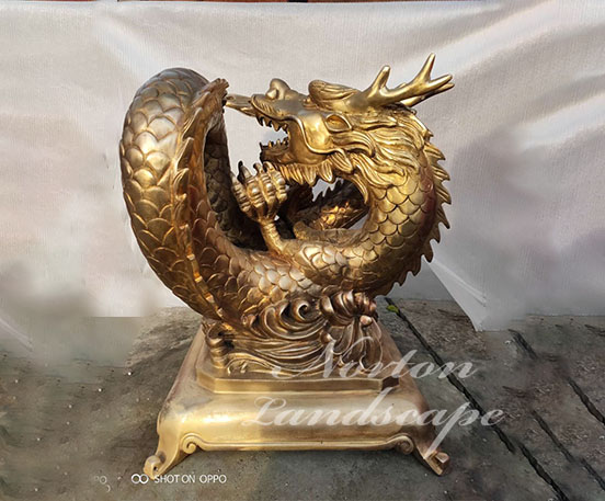 brass dragon sculpture