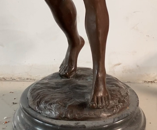 Bronze boy sculpture