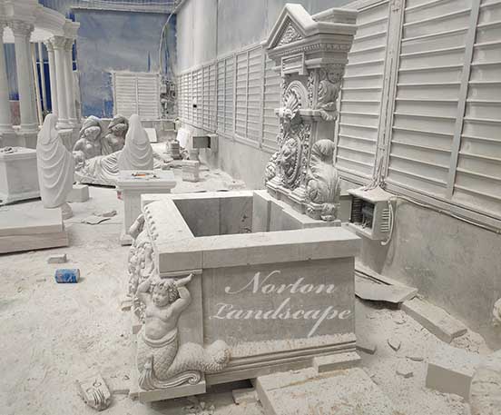 Luxury marble fountain with carved statues