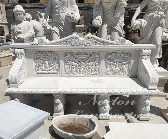 White carved marble bench
