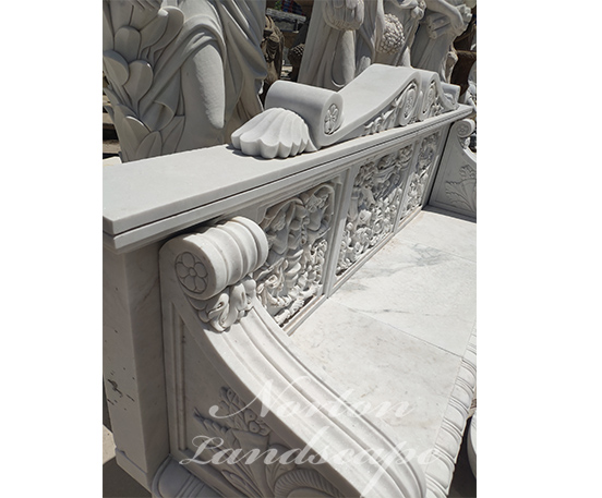 White carved marble bench