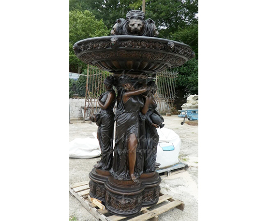 Bronze woman statue fountain