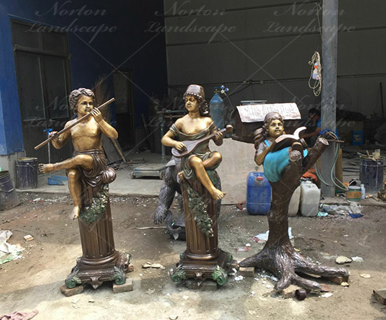 Bronze children statues