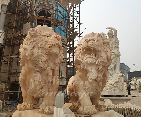 Sunset red marble lion statues