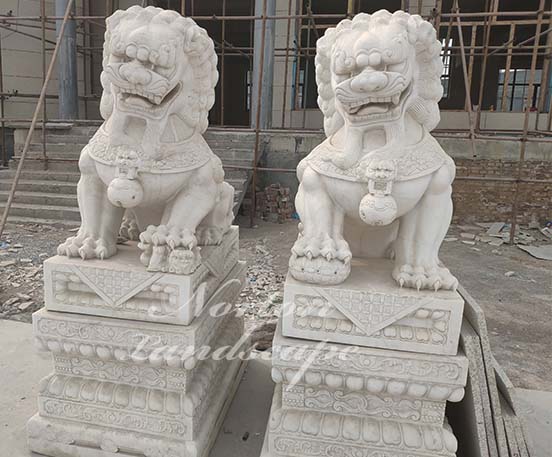Large marble foo dog statues