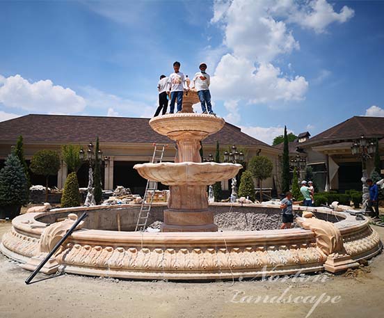 Large sunset red marble fountain