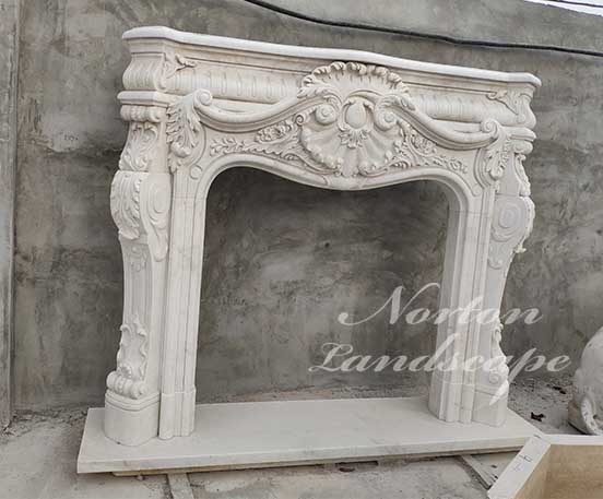 Hand carved European Style fireplace