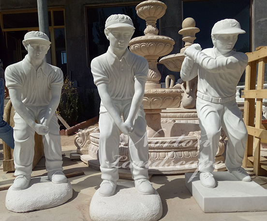 Marble statue of boy playing baseball