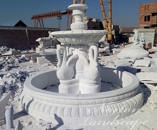 Marble fountain with swan statues