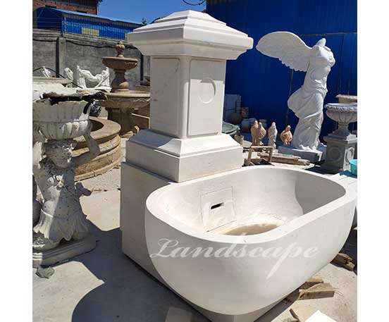 Simple white marble fountain