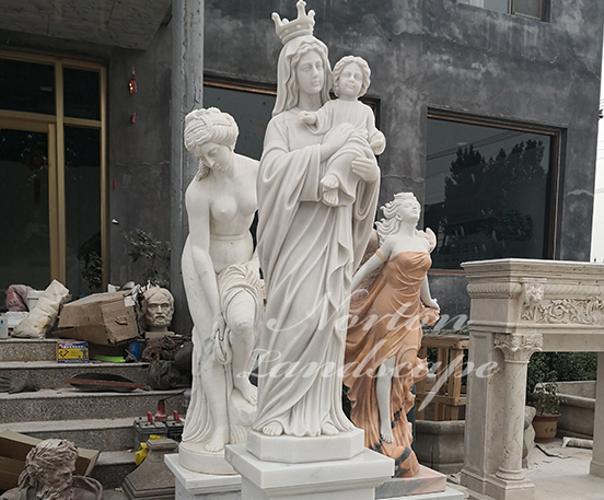 White marble Virgin mary holding child statue