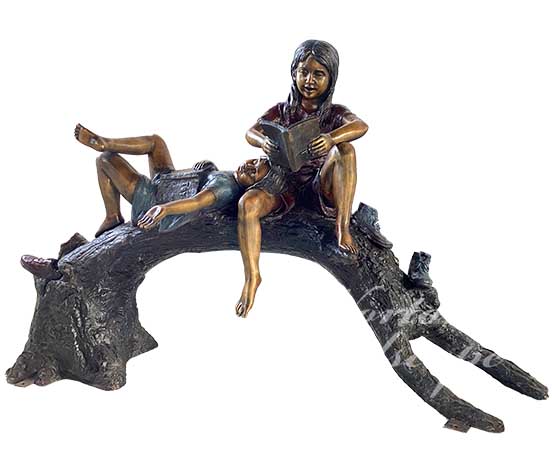 Bronze children reading statues