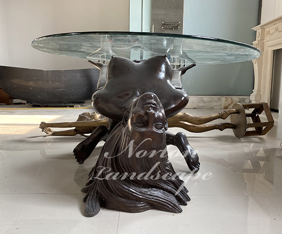 Bronze woman coffee table sculpture
