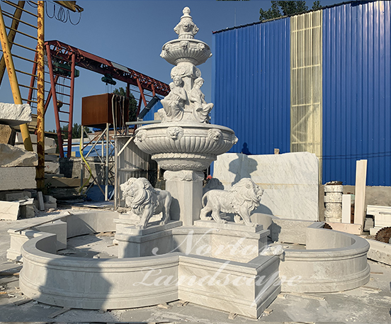 Big stone marble lion statues water fountain