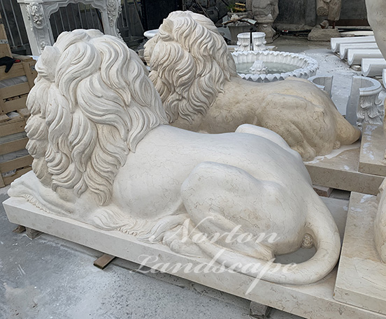Marble lying lion statues
