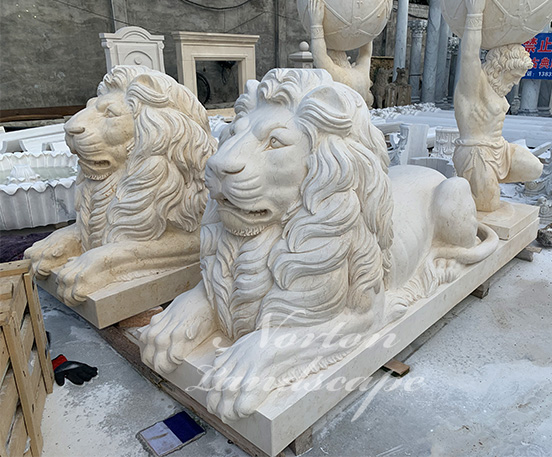 Marble lying lion statues