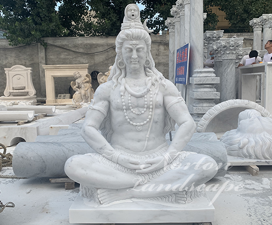 White marble sitting shiva statues fountain