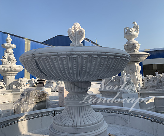 Large white stone marble water fountain