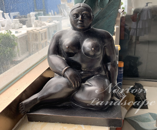 Bronze Fernando Botero fat lady statues