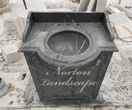 Freestanding black marble basin sink