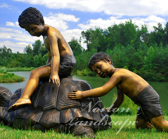 Bronze tortoise and child statue