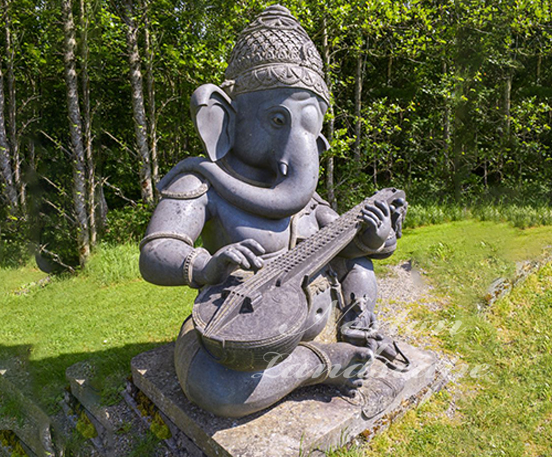 Garden stone ganesha with Musical instrument