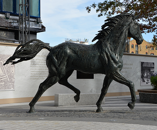 Antique bronze running horse statue