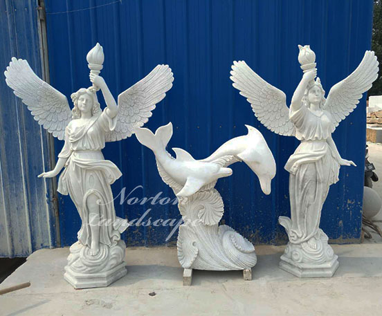 Marble statue of an angel holding a torch