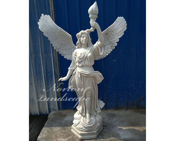 Marble statue of an angel holding a torch