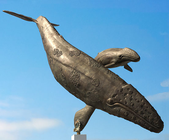 Bronze whale tail sculpture