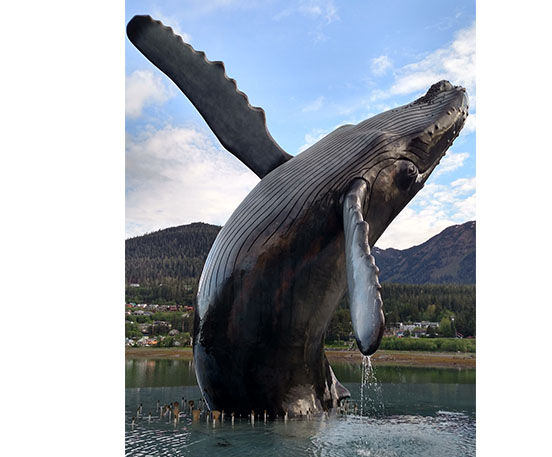 Bronze whale tail sculpture