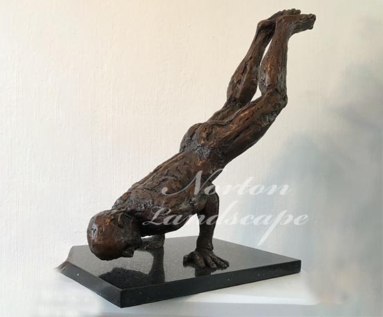 bronze acrobatics nude man statue