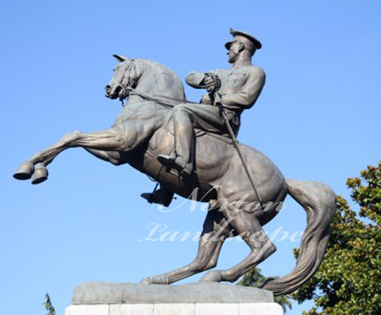 Bronze man on horse statue