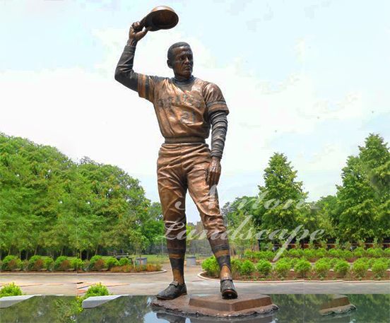 Bronze baseball player statue