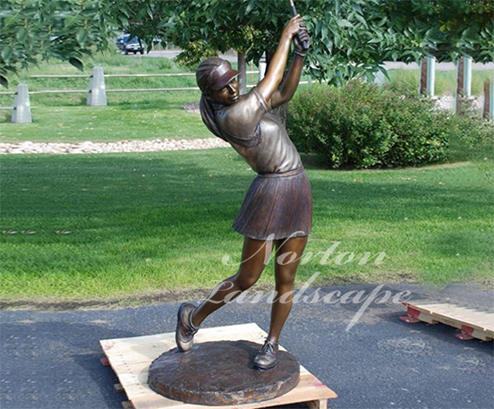 Bronze baseball player statue